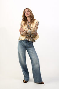 Slowlove Jeans con abertura en el dobladillo