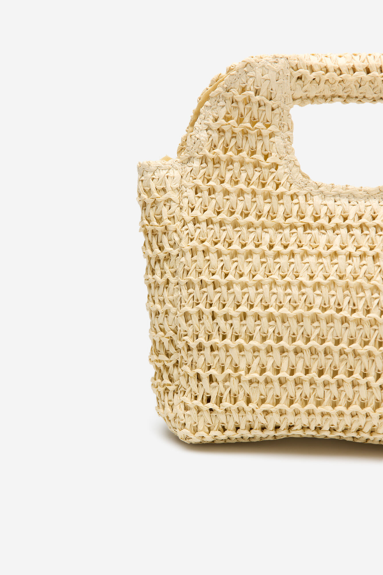 Cortefiel Bolsa trenzada de rafia Marfil