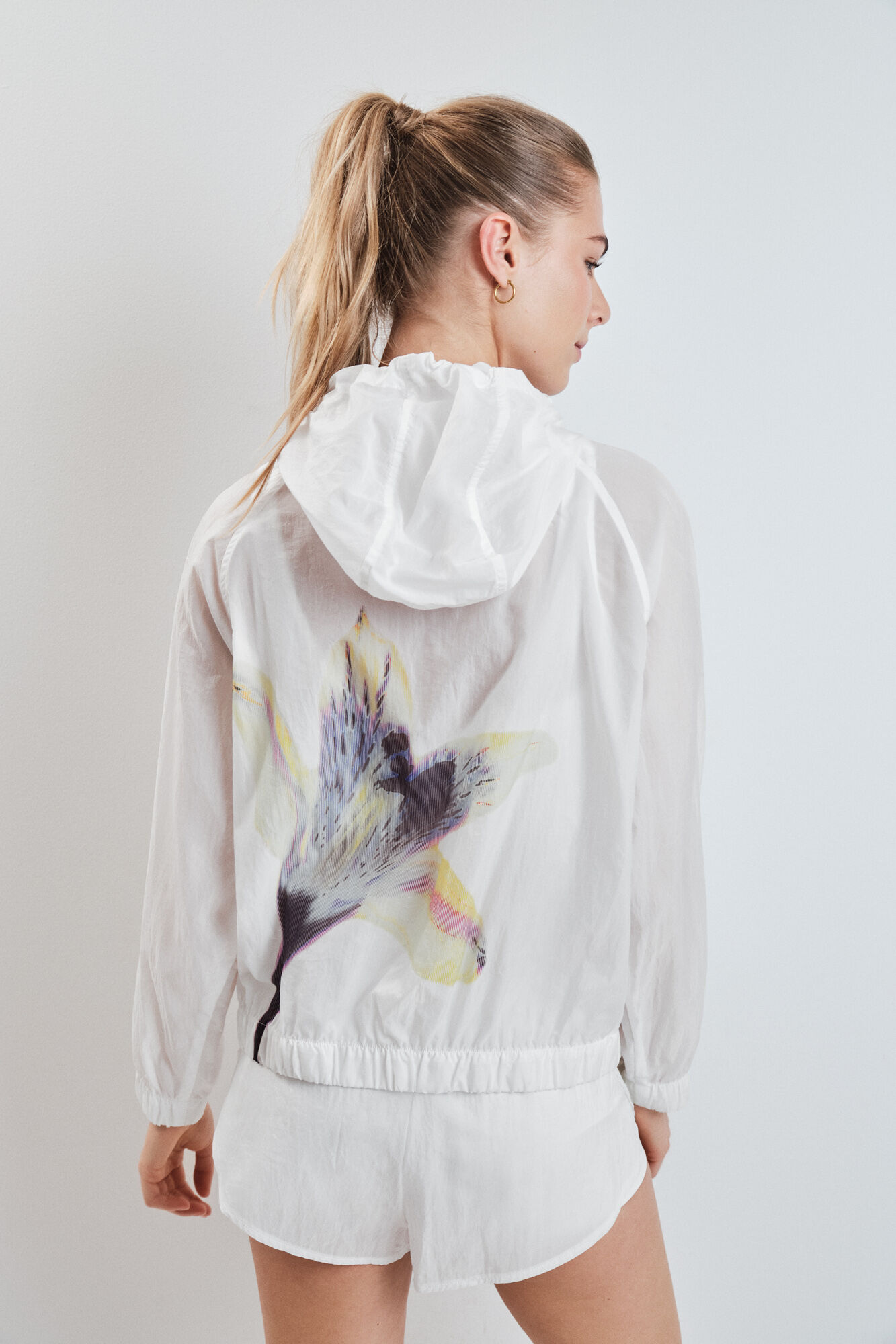 Dash and Stars Chamarra cortavientos con capucha blanca
