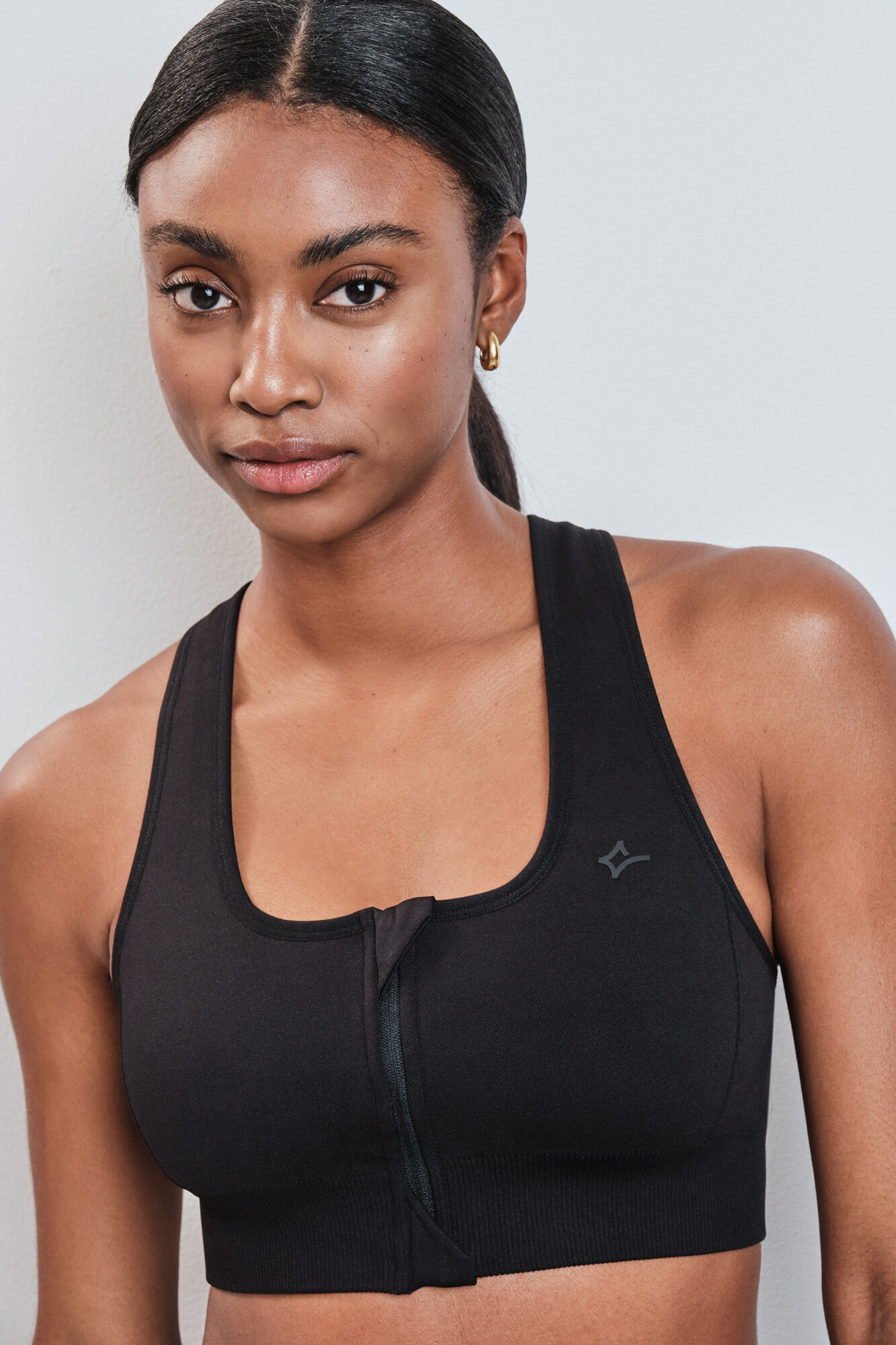 Dash and Stars Brasier deportivo con cierre central SEAMLESS FIT negro