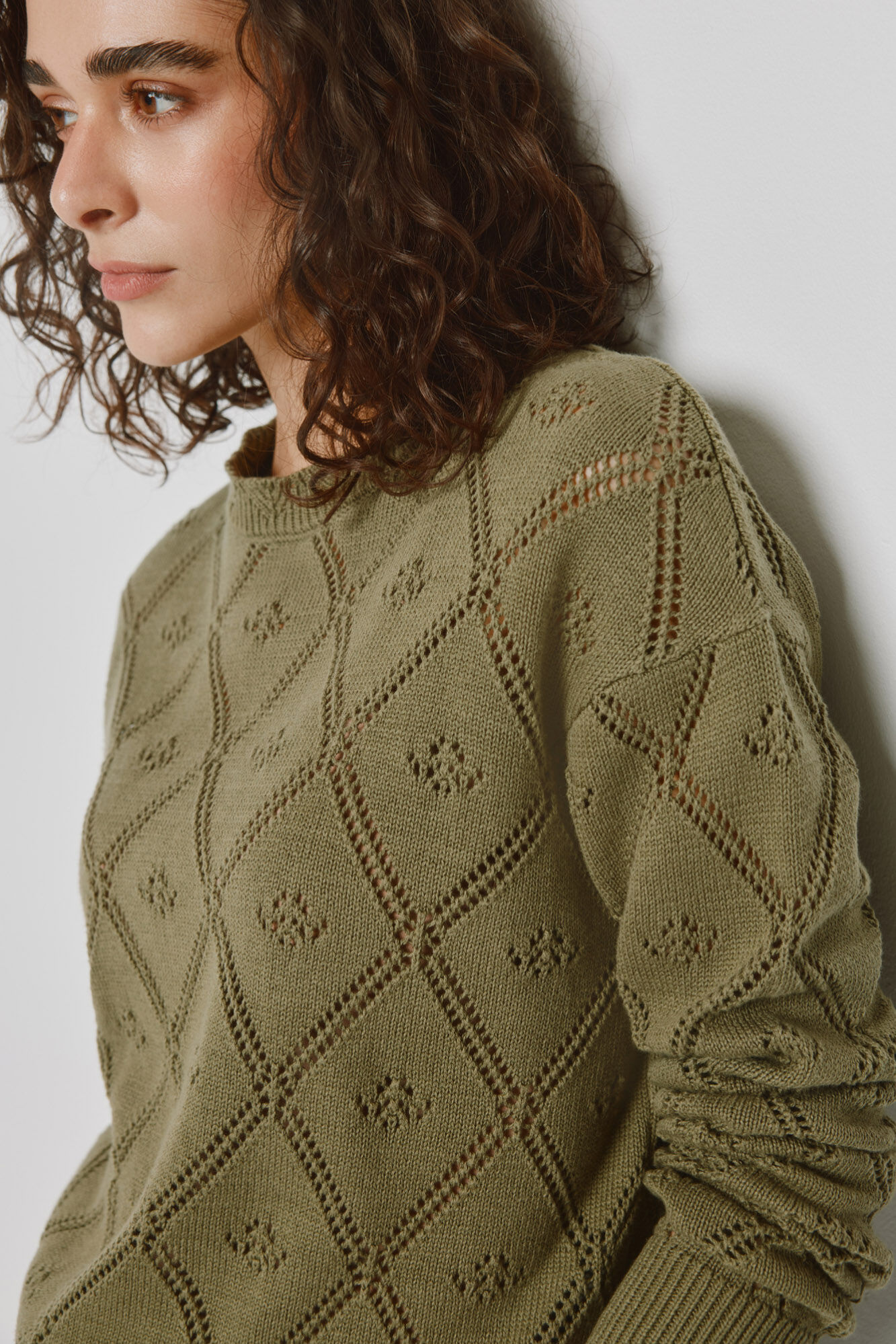 Milano Su&eacute;ter cuello redondo con dise&ntilde;o calado