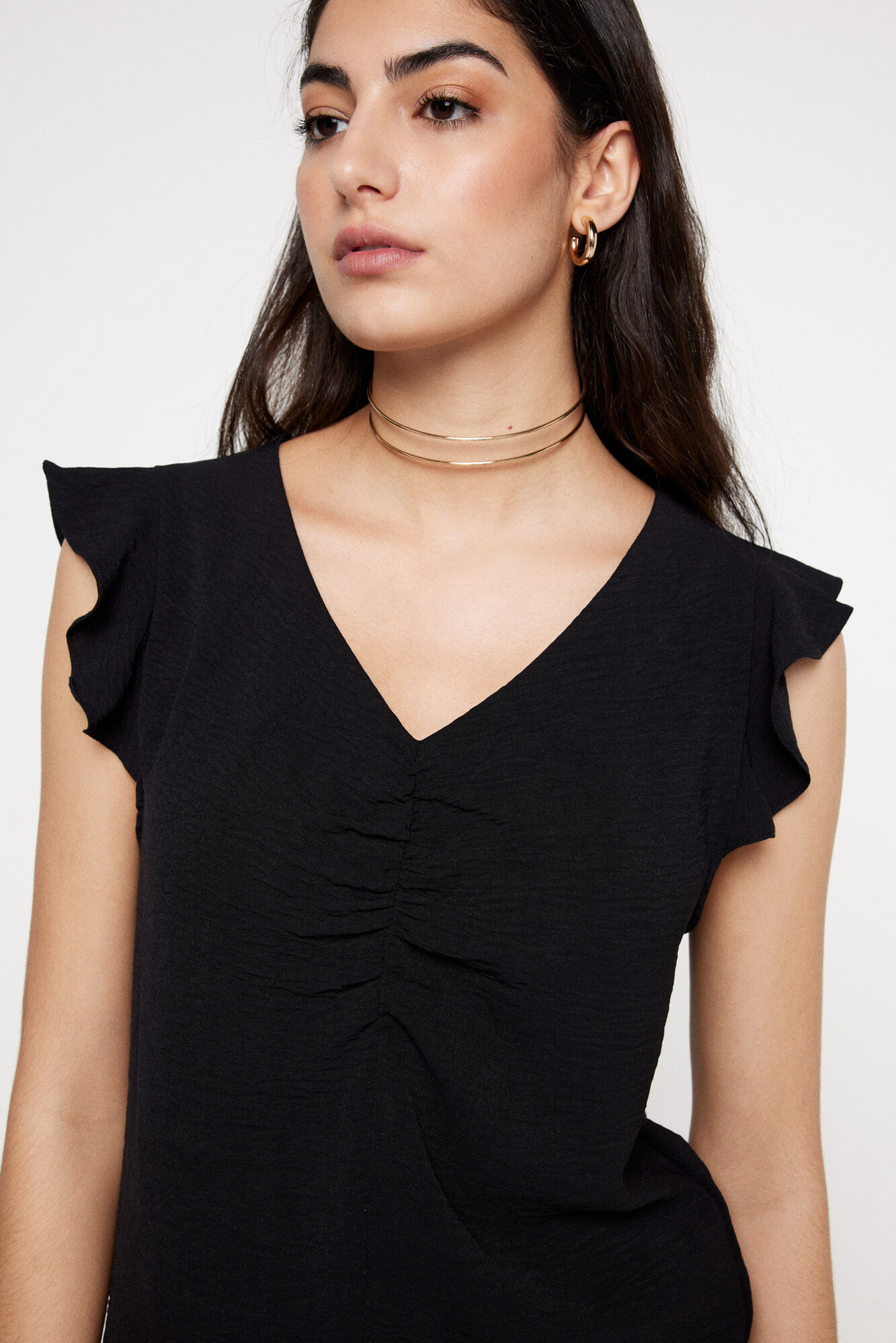 Milano Blusa fruncido escote. Negro
