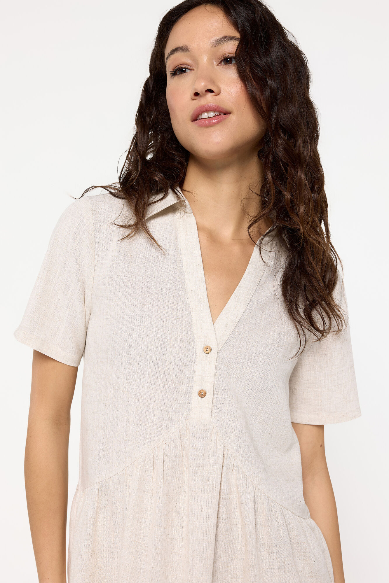 Milano Vestido corto tejido r&uacute;stico, corte fluido. Beige