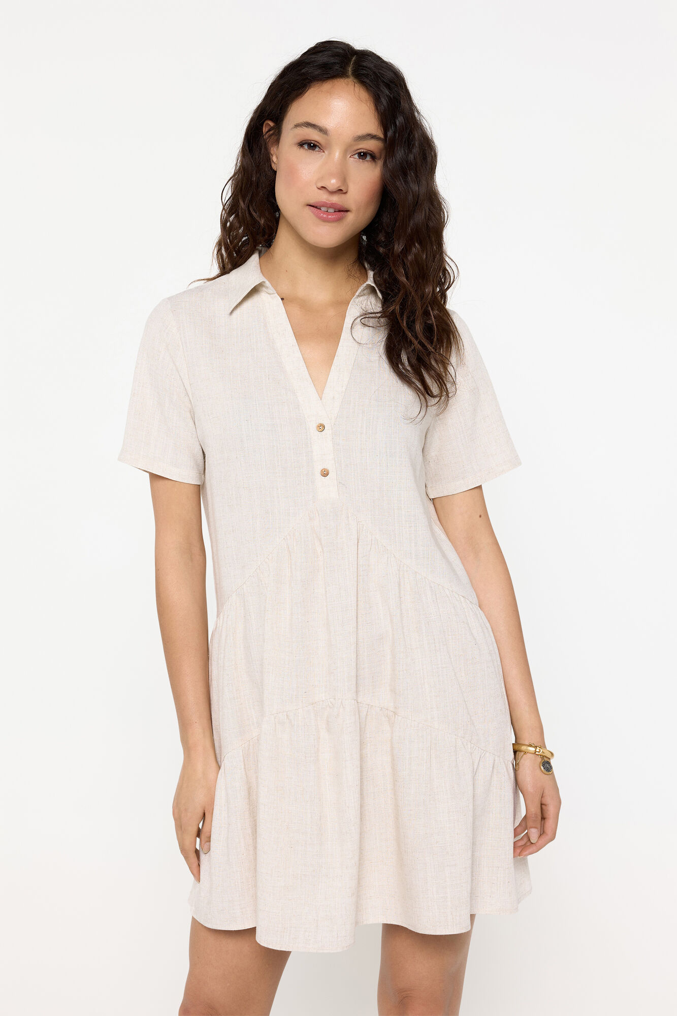 Milano Vestido corto tejido r&uacute;stico, corte fluido. Beige