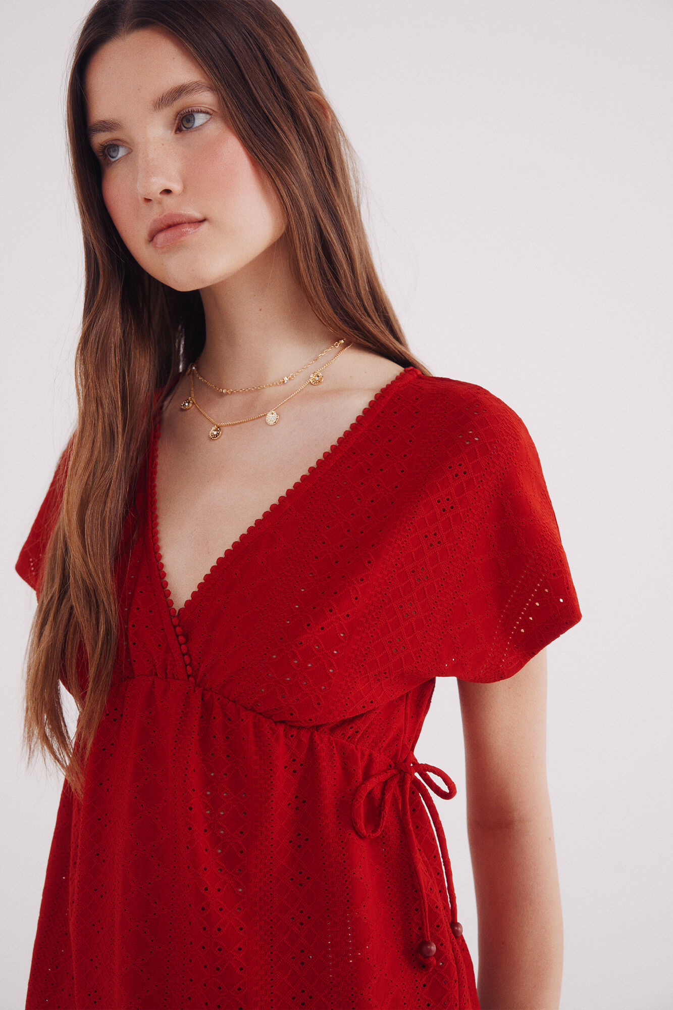 Springfield Top bordado suizo lazos cintura