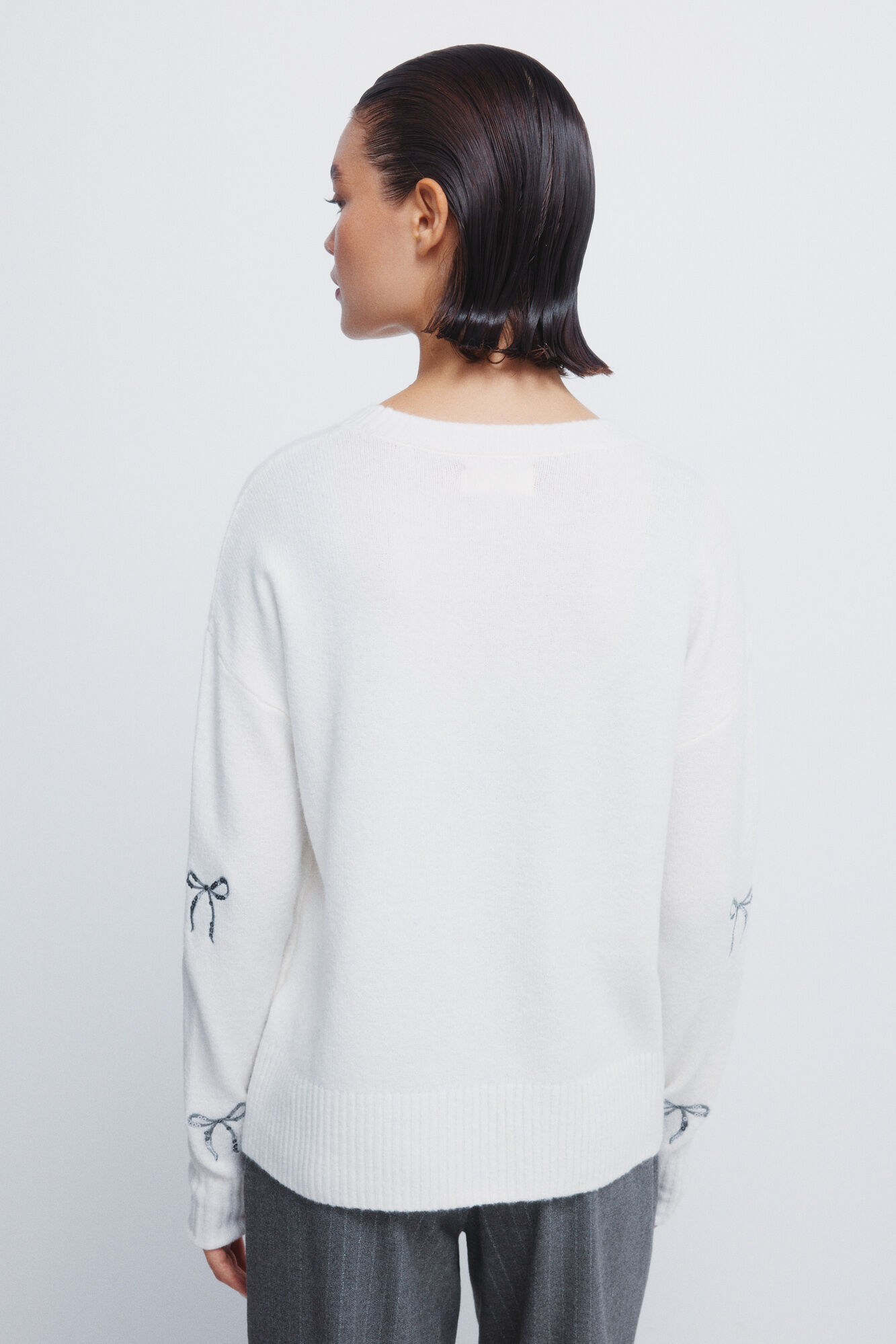 Springfield Jersey con lazos de lentejuelas marfil