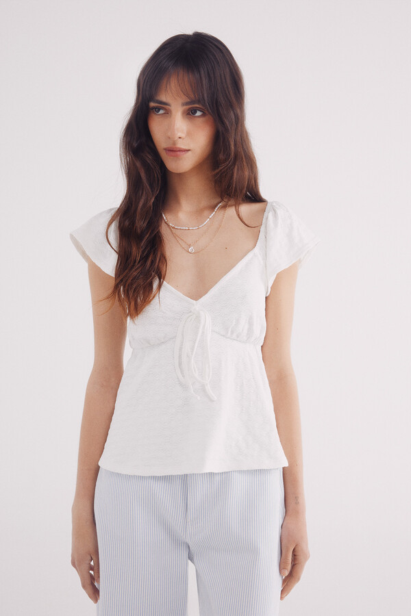 Springfield Top escote lazo bordado suizo natural