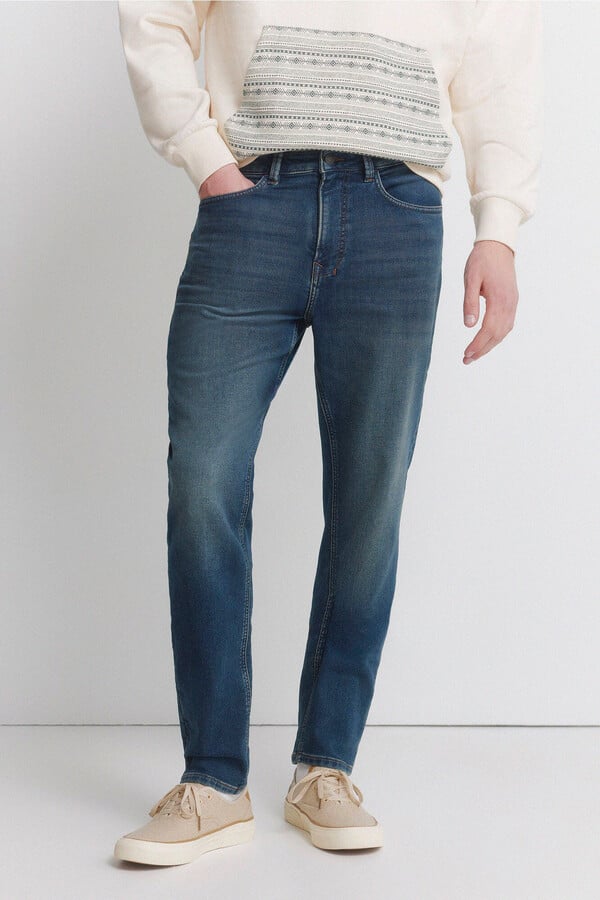 Jeans slim fit de knit denim sobretintado | Pantalones de mezclilla ...