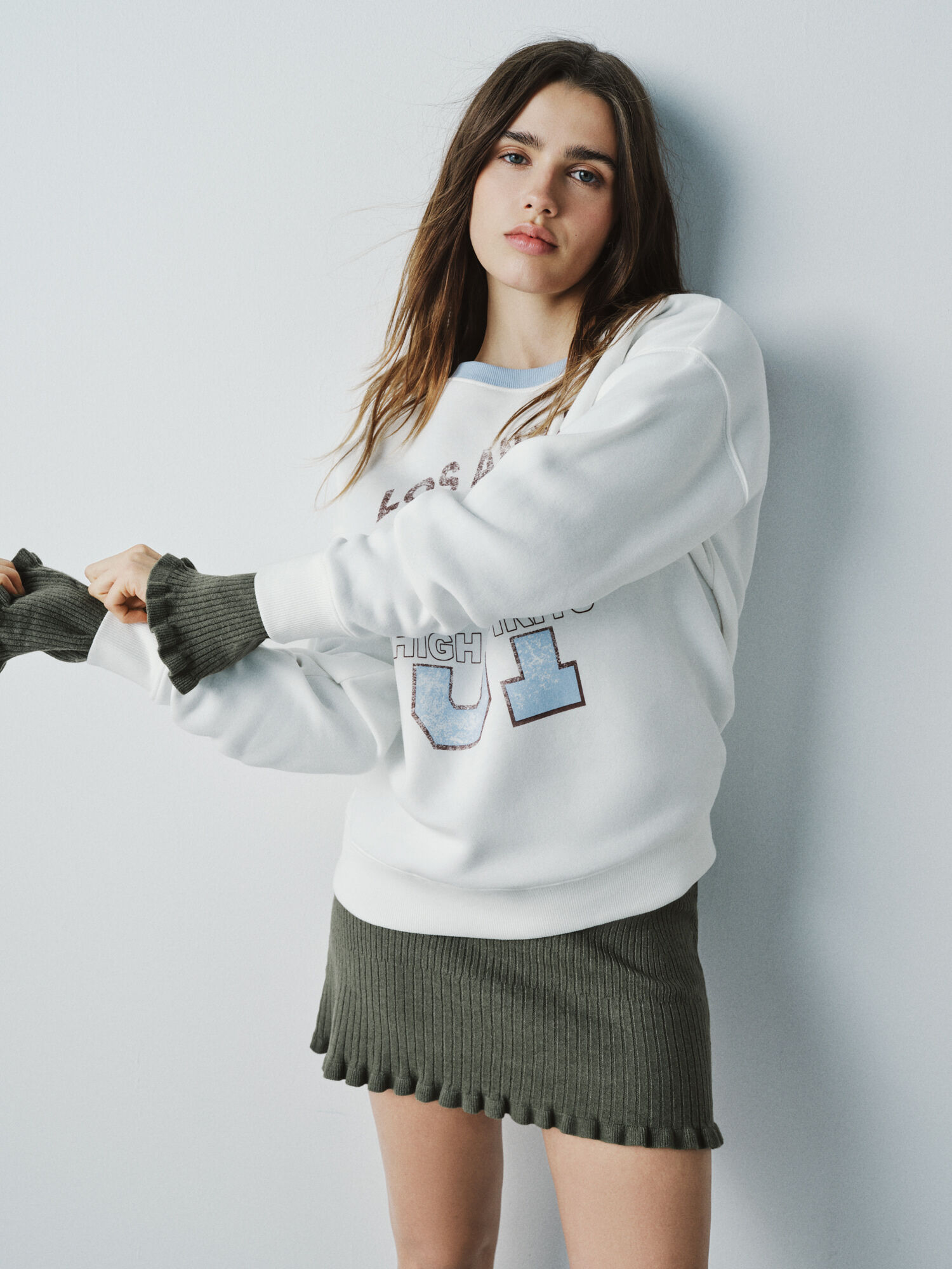 High Spirits Su&eacute;ter miel blanco