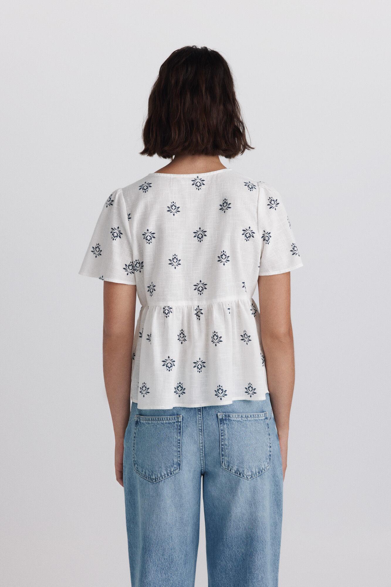 Springfield Camisa peplum con detalles en el escote blanco