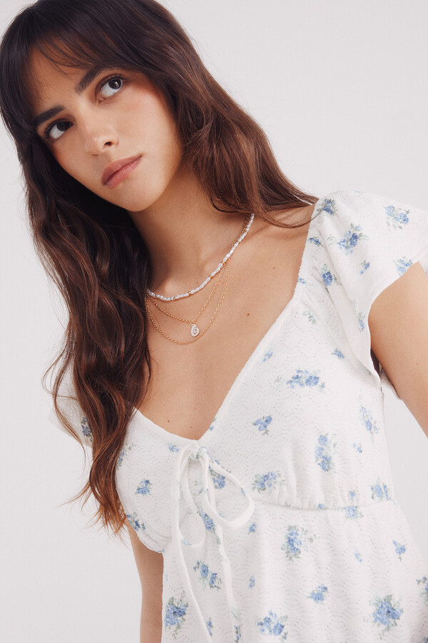 Springfield Top escote lazo bordado suizo estampado