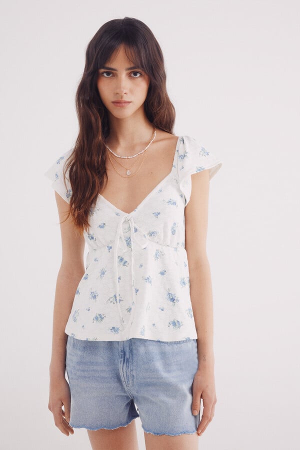 Springfield Top escote lazo bordado suizo estampado