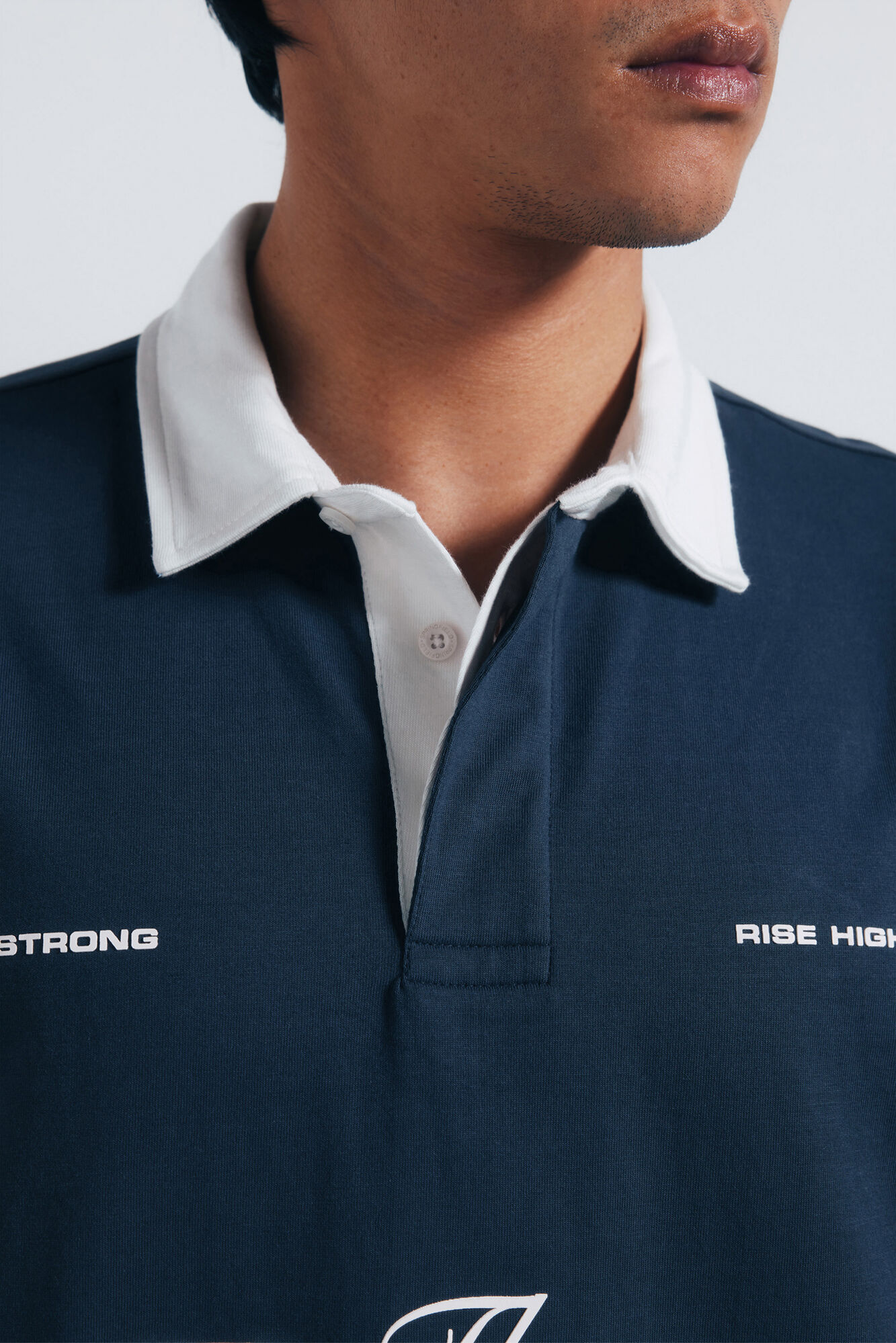 Springfield Polo de rugby con textos de corte cuadrado azul indigo