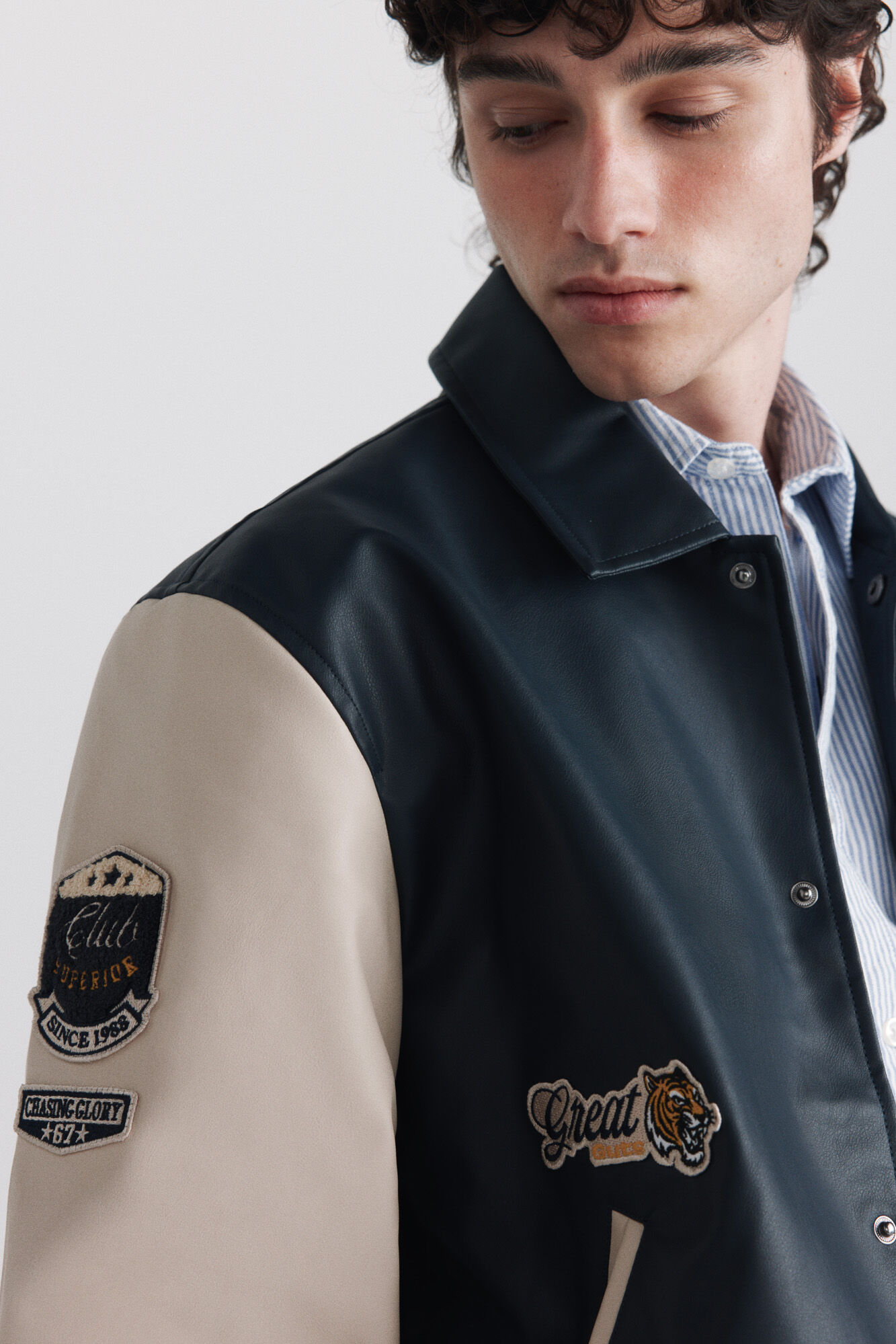 Springfield Chamarra bomber efecto piel varsity azul