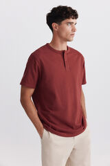 Springfield Playera cuello redondo con botones de piqu&eacute; texturizado naranja