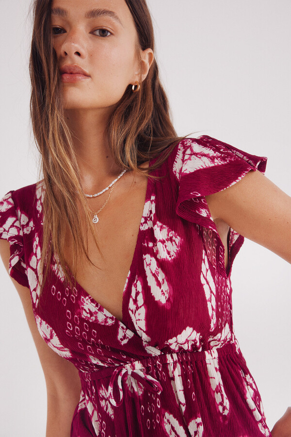 Springfield Top escote cruce estampado púrpura