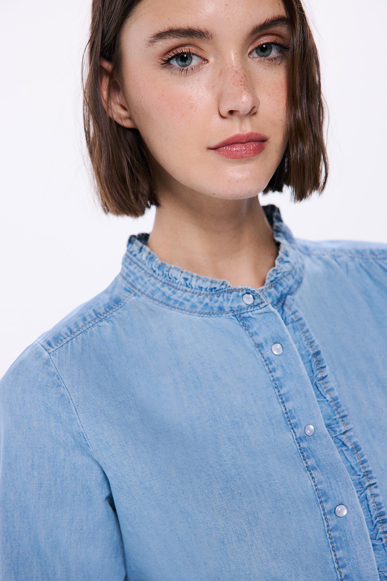 Springfield Blusa denim volantes azul tinta