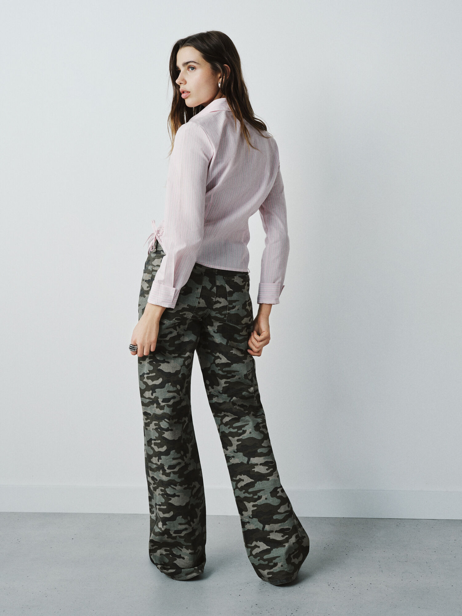 High Spirits Blusa p&eacute;talo fucsia