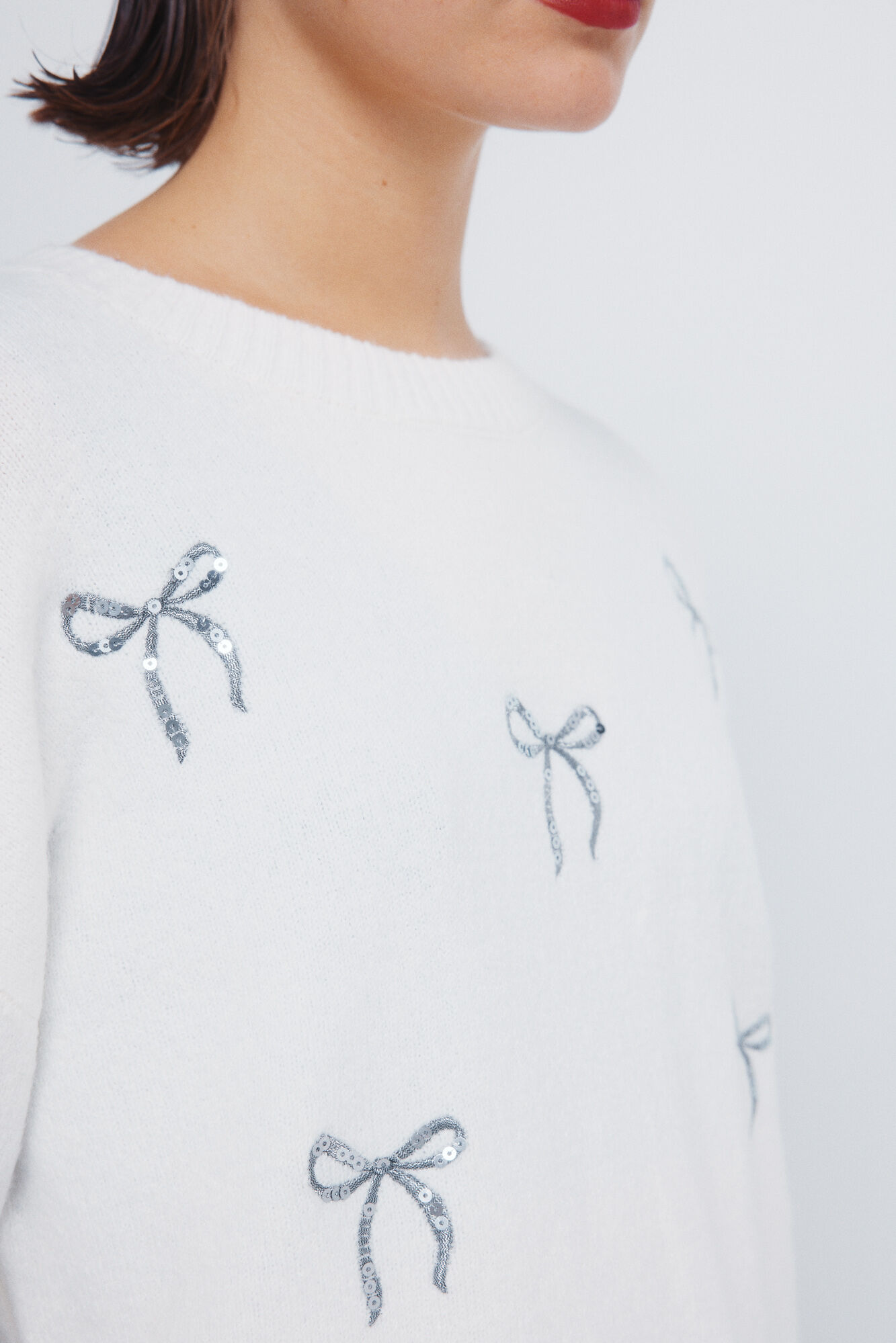 Springfield Jersey con lazos de lentejuelas marfil