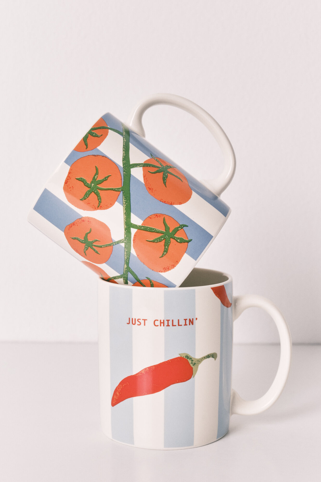 Women'secret Pack 2 tazas estampado de rayas, chiles y tomates marfil