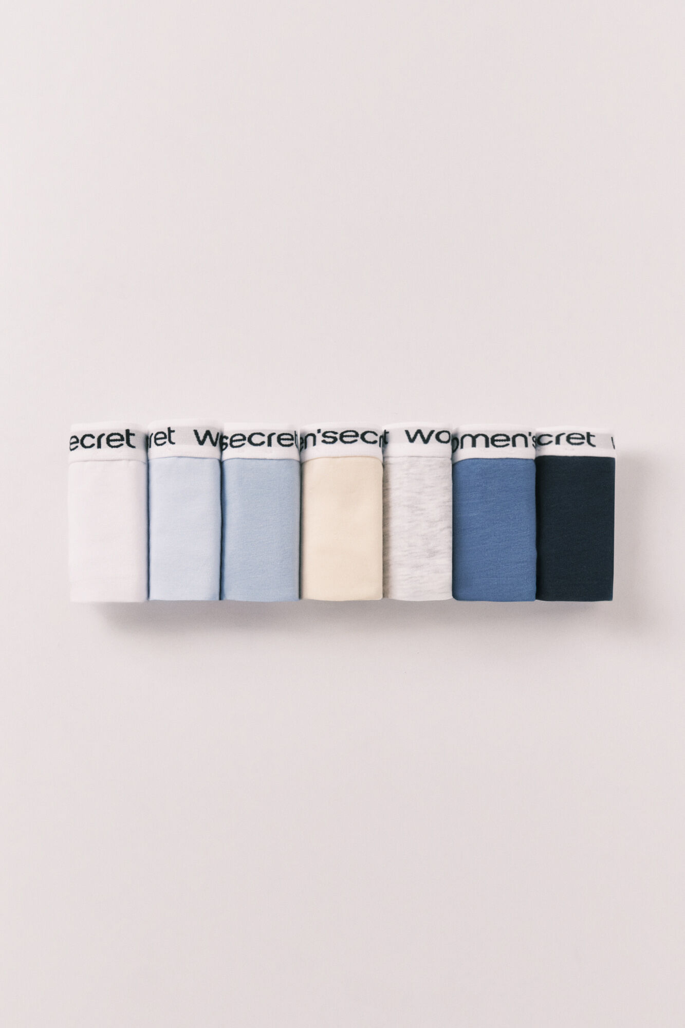Women'secret Pack 7 tangas de algod&oacute;n lisas con logo blanco