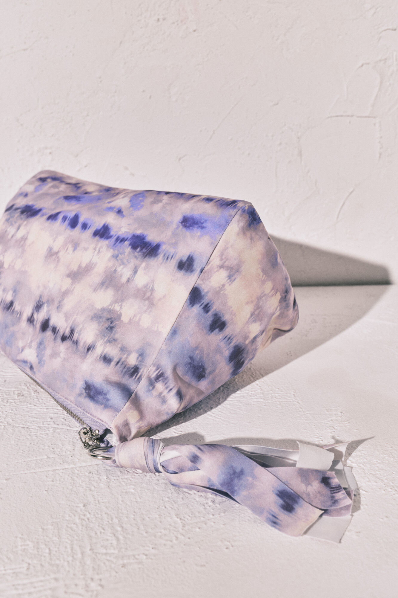 Women'secret Bolsa para traje de ba&ntilde;o y bikini impermeable Tie Dye lila estampado