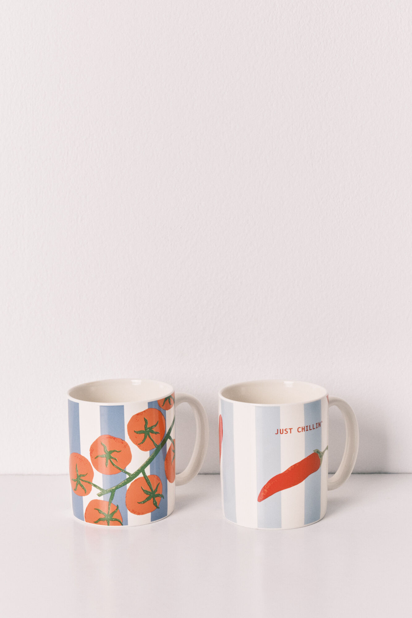 Women'secret Pack 2 tazas estampado de rayas, chiles y tomates marfil