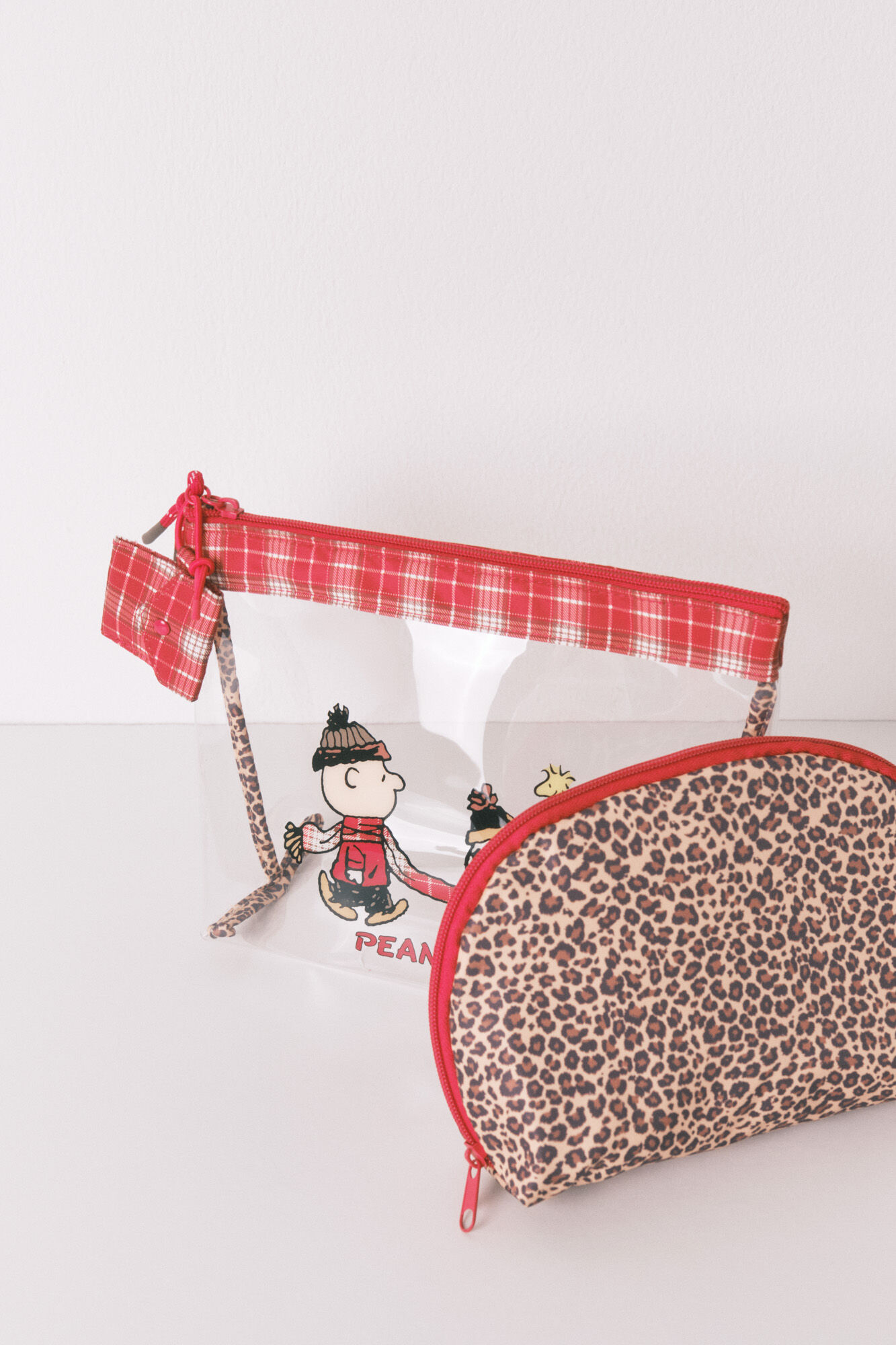 Women'secret Pack de 2 neceseres con estampado animal y Snoopy rojo