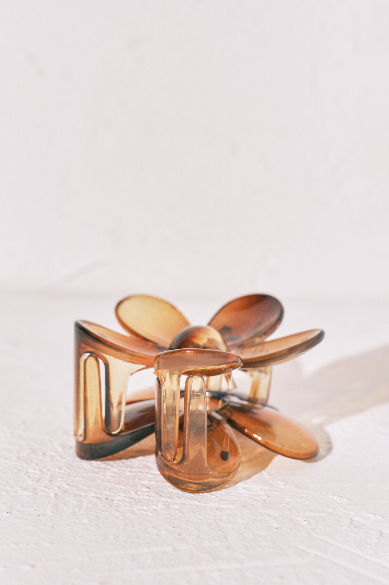 Women'secret Pinza para el pelo con forma de flor marr&oacute;n caf&eacute;
