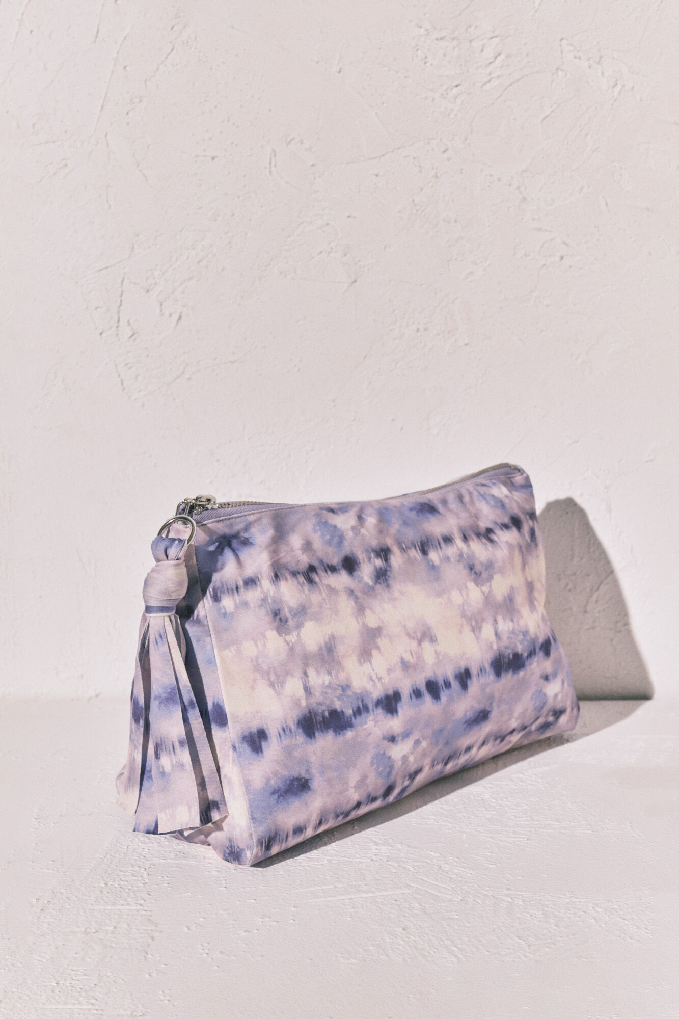 Women'secret Bolsa para traje de ba&ntilde;o y bikini impermeable Tie Dye lila estampado