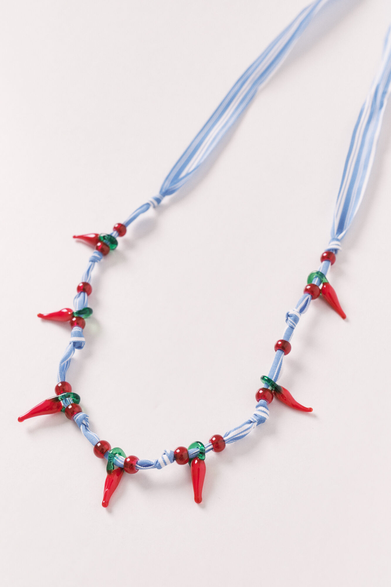 Women'secret Collar de tela con cuentas chili azul