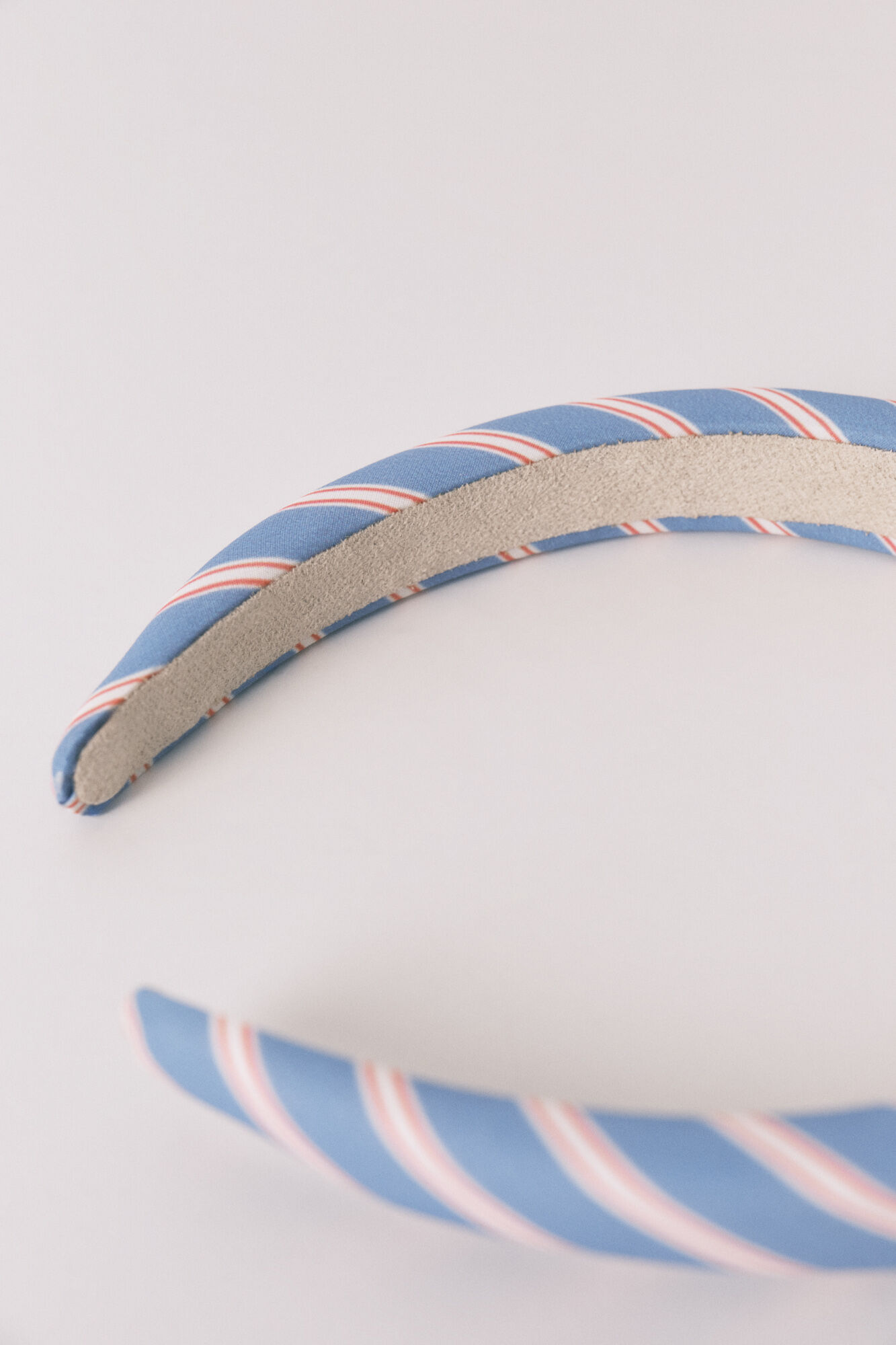 Women'secret Diadema con estampado a rayas azul"