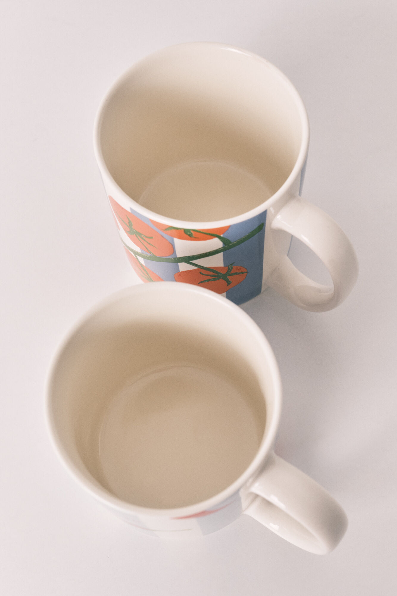 Women'secret Pack 2 tazas estampado de rayas, chiles y tomates marfil